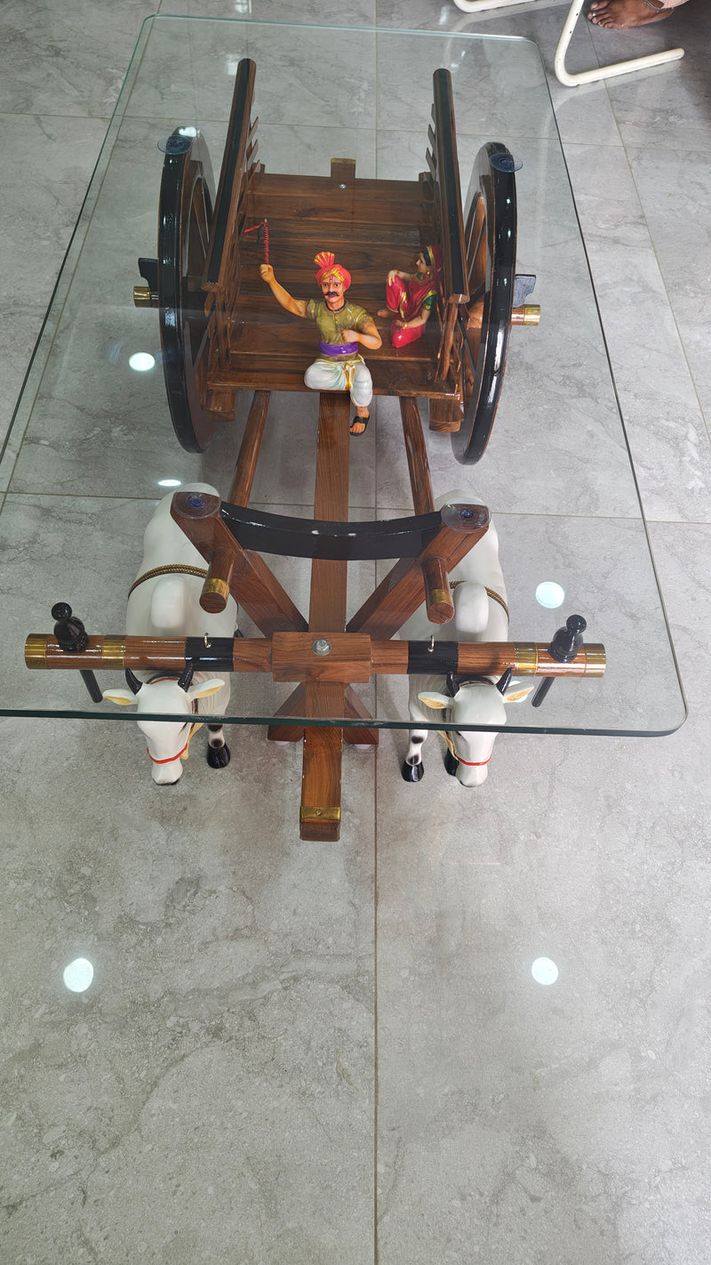 Close-up of the spoked wheel and wood grain